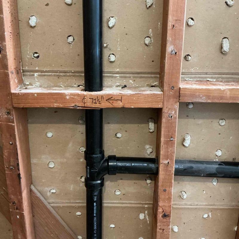 3-inch ABS branch drain line installation in wall framing