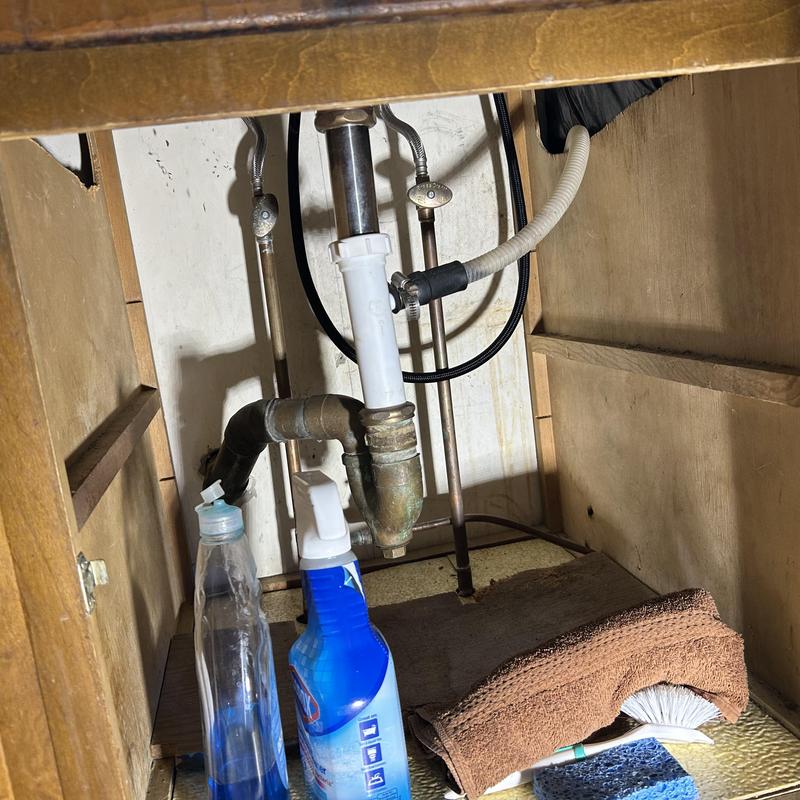 Kitchen sink drain and capped copper water lines Kitchen sink drain and capped copper water lines