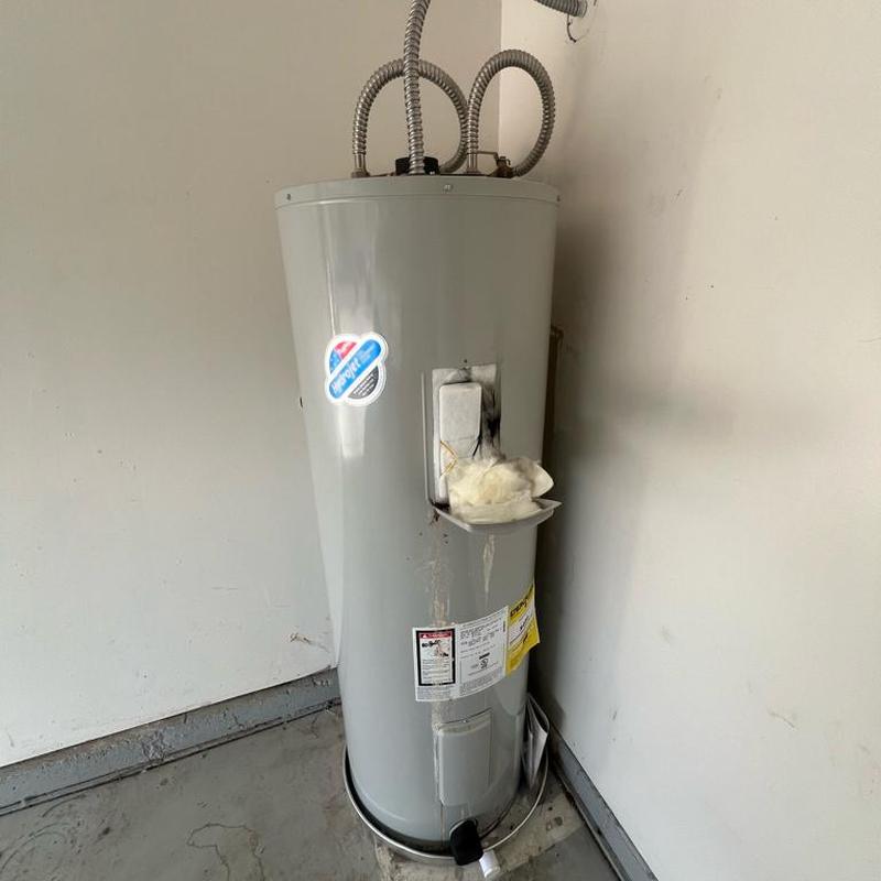 Bradford White electric water heater with damaged element panel