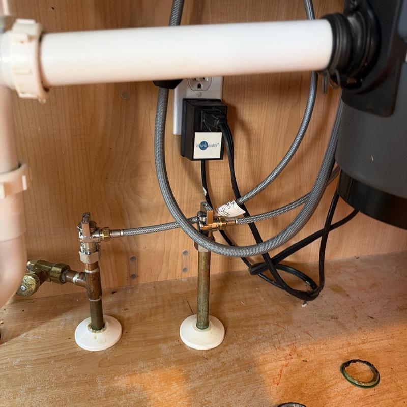 Quarter turn angle stops with braided supply lines under sink