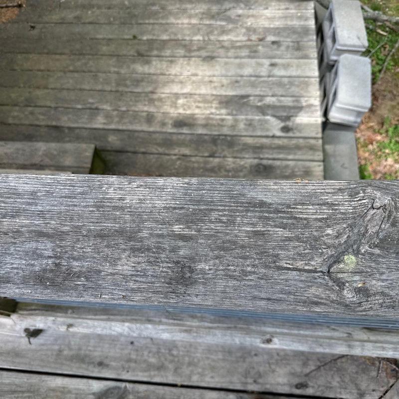 Wooden deck railing weathering and discoloration