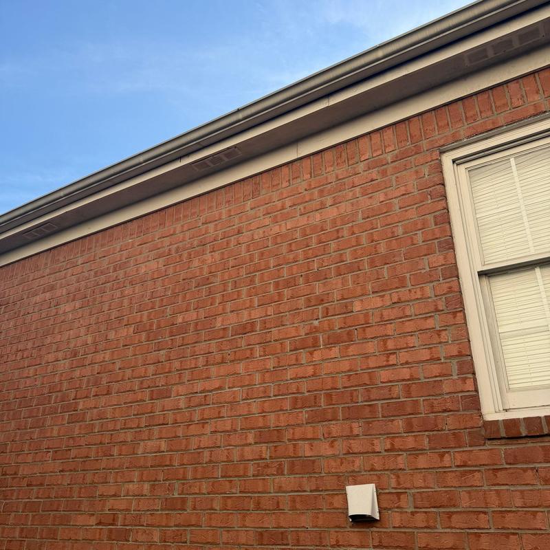 Roof gutter and fascia inspection on brick home in Brentwood