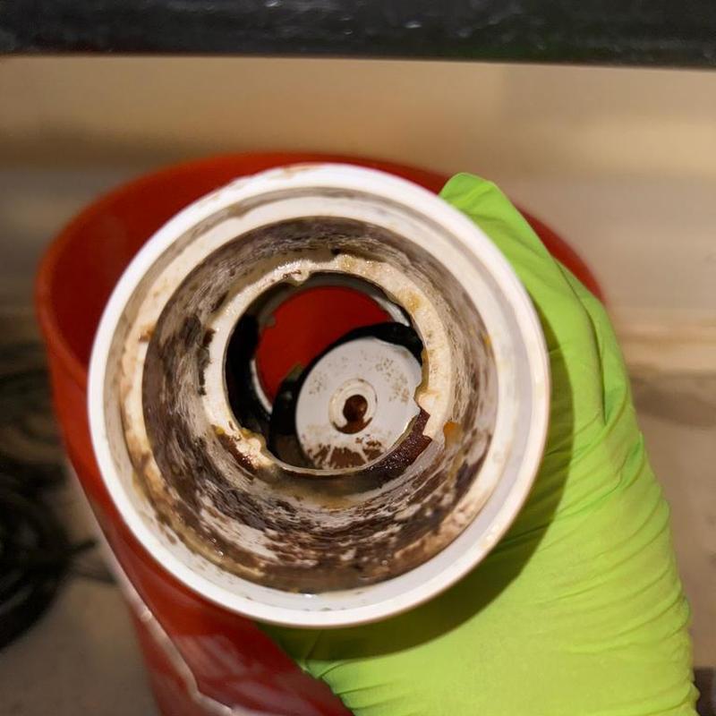 Swing check valve with damaged flap inside pipe