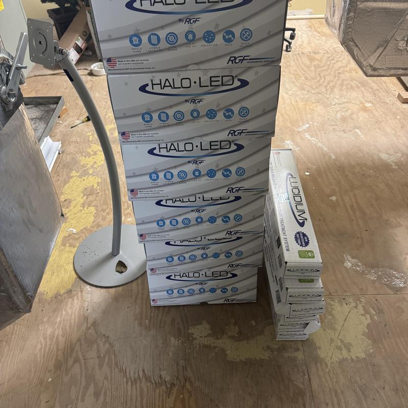 Reme Halo LED air purifier boxes stacked on floor