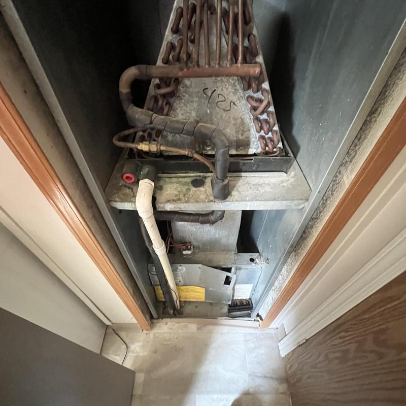 Gas HVAC furnace components in narrow utility closet