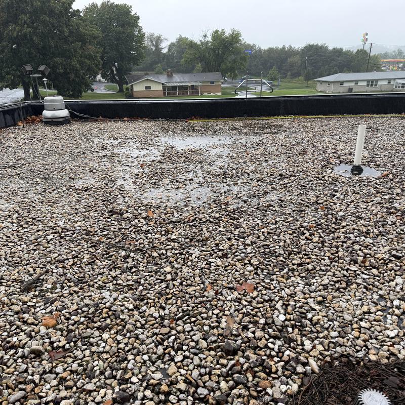 EPDM roofing with stone ballast and standing water ponds EPDM roofing with stone ballast and standing water ponds