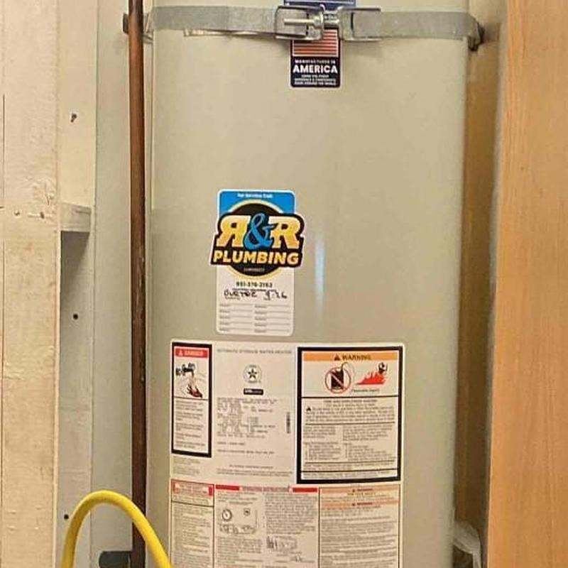 40-gallon electric water heater installation in closet