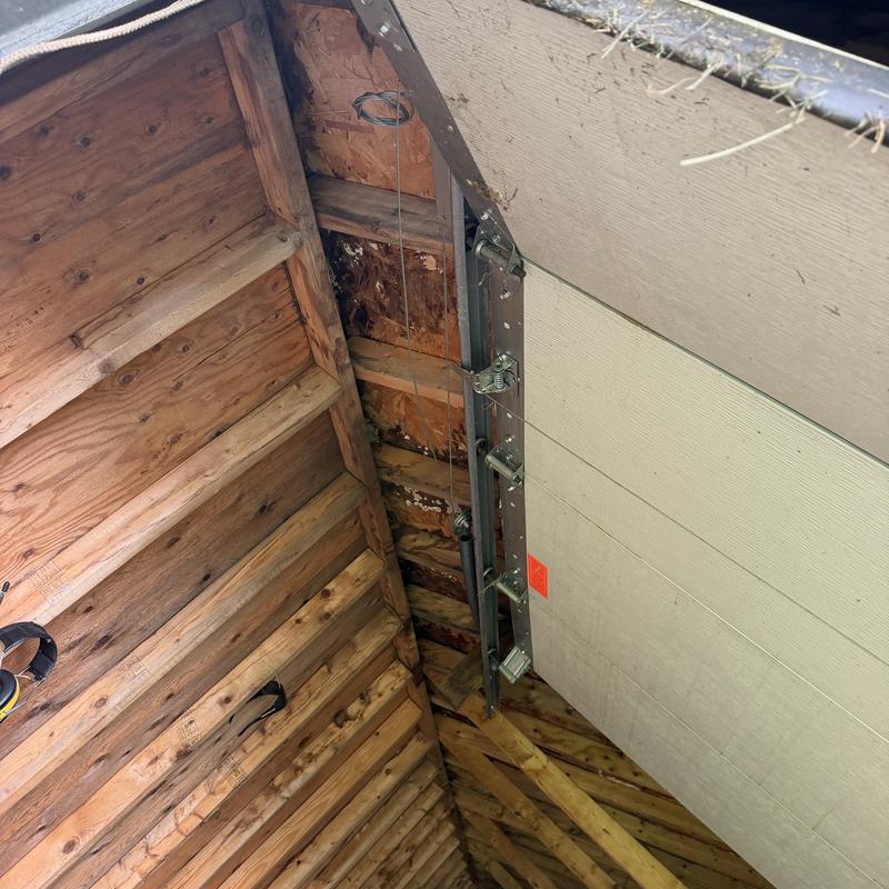 Garage roof decking with water damage inspection Garage roof decking with water damage inspection