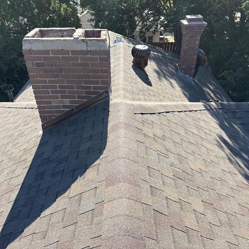 Tamko Titan XT shingle roof with brick chimneys Tamko Titan XT shingle roof with brick chimneys