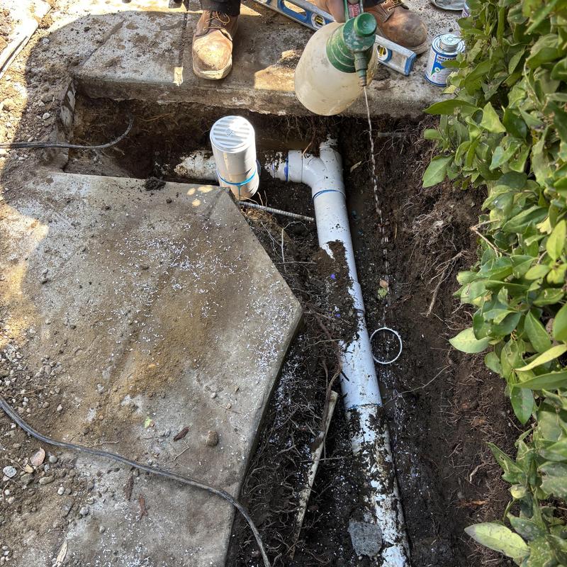 Storm drain pipe with new access vent installation Storm drain pipe with new access vent installation