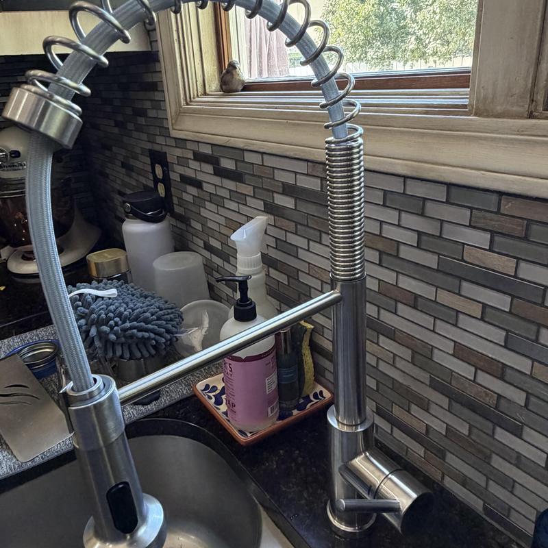Kitchen faucet with flexible spring spout installation