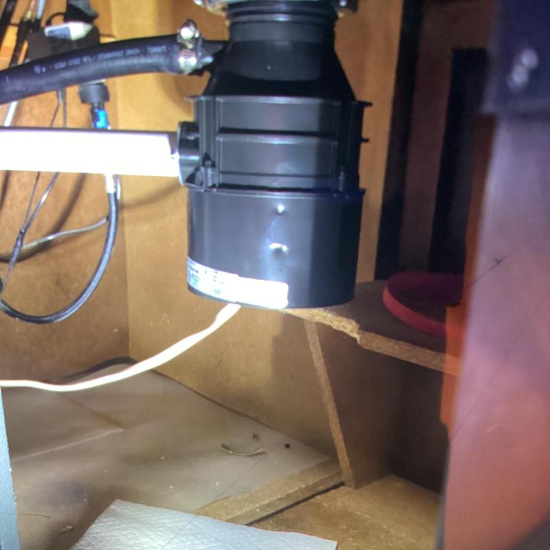 Insinkerator garbage disposal installed under kitchen sink Insinkerator garbage disposal installed under kitchen sink
