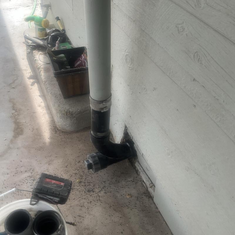 Main sewer line cleanout installation and piping