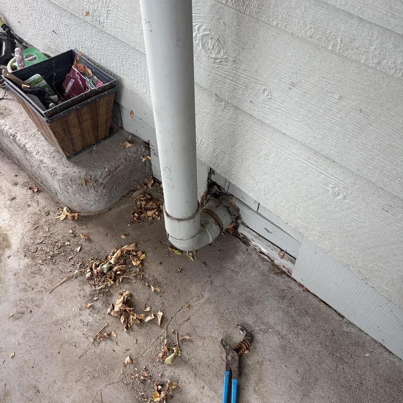 Sewer cleanout pipe installation with plumbing tools