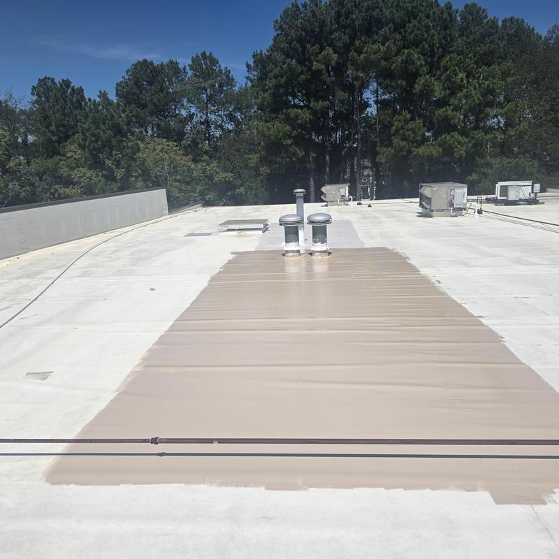 Silicone roof restoration on TPO commercial roof Silicone roof restoration on TPO commercial roof