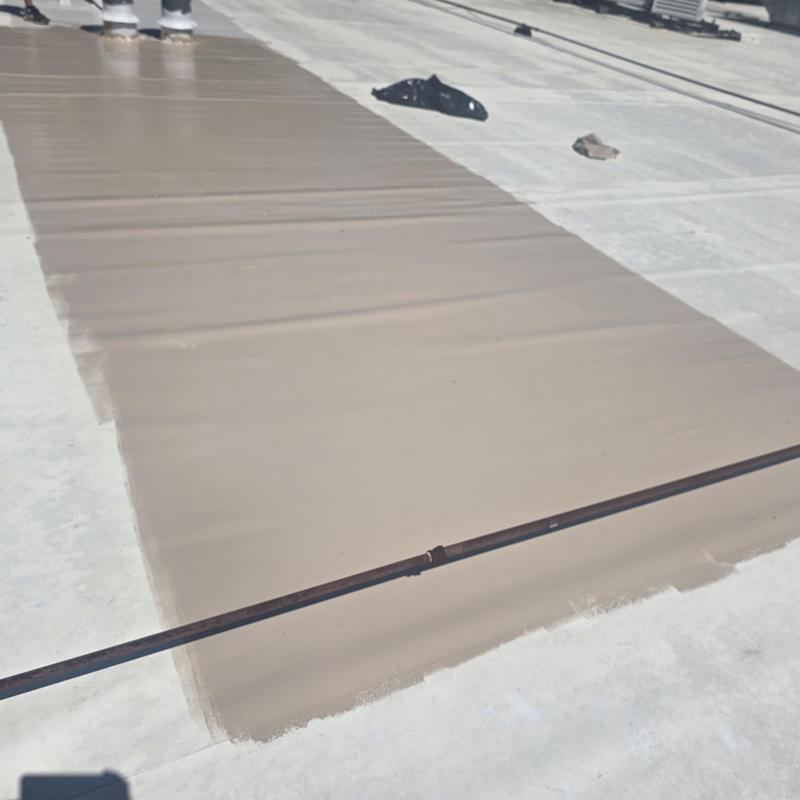 Silicone roof restoration on TPO roof surface Silicone roof restoration on TPO roof surface