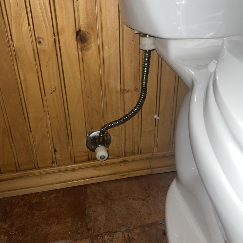Toilet fill valve and supply line installation detail