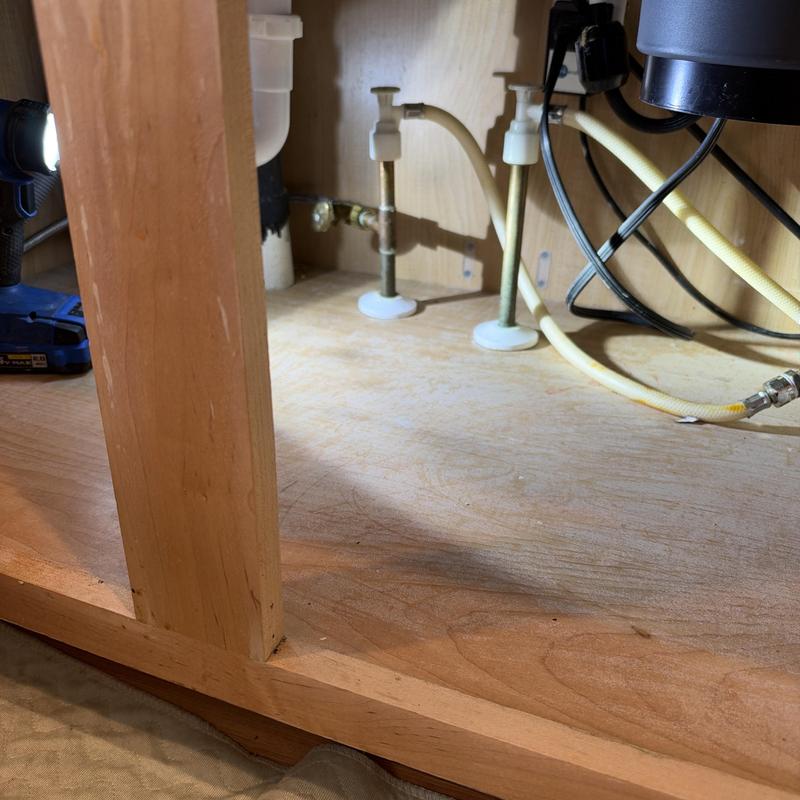 Kitchen faucet angle stop valves and supply lines under sink