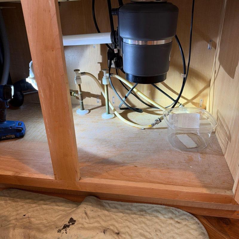 Kitchen faucet angle stop valves under sink with disposer