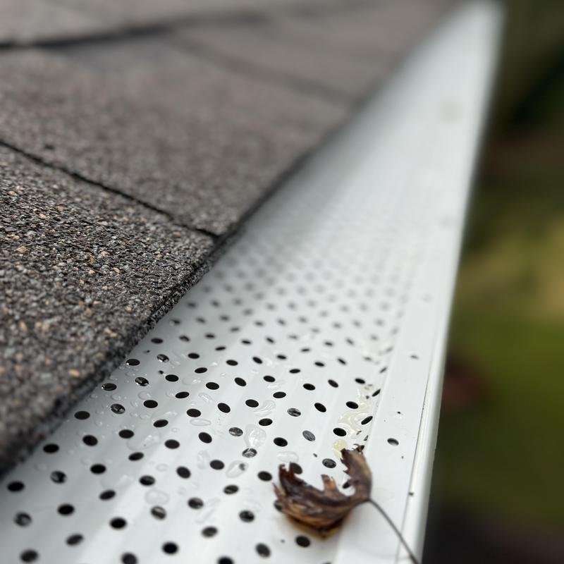 Gutter Rx aluminum gutter guard on roof edge Gutter Rx aluminum gutter guard on roof edge