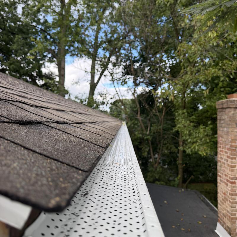 Gutter Rx aluminum gutter guards installed on roof edge Gutter Rx aluminum gutter guards installed on roof edge