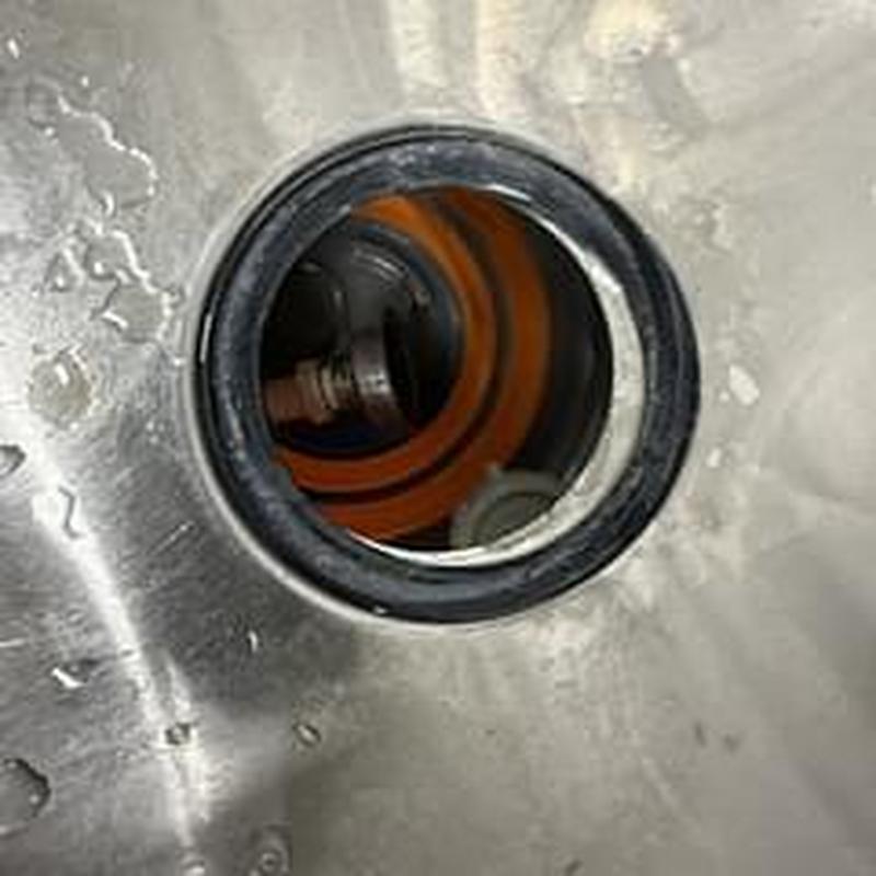 Basket strainer rubber seal leaking under sink
