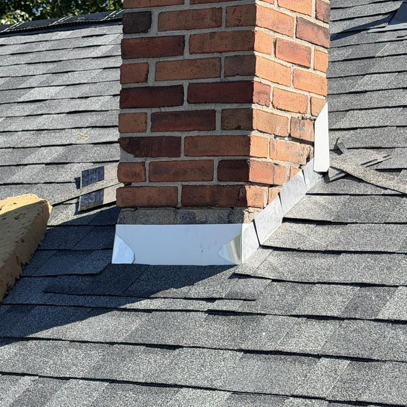 Chimney flashing with Owens Corning asphalt shingles Chimney flashing with Owens Corning asphalt shingles