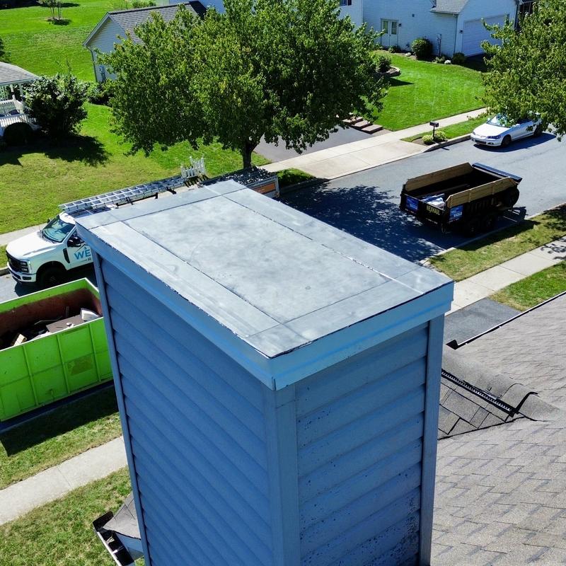 EPDM rubber chimney roof with new perimeter tape EPDM rubber chimney roof with new perimeter tape