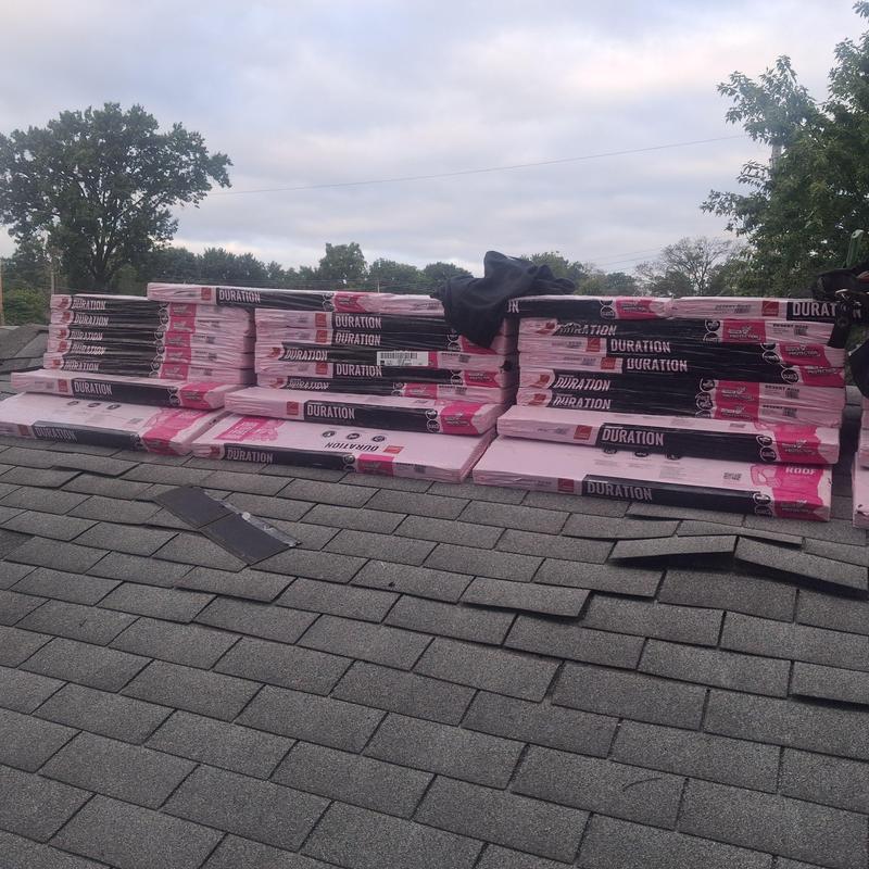 Owens Corning Duration shingles stacked on roof
