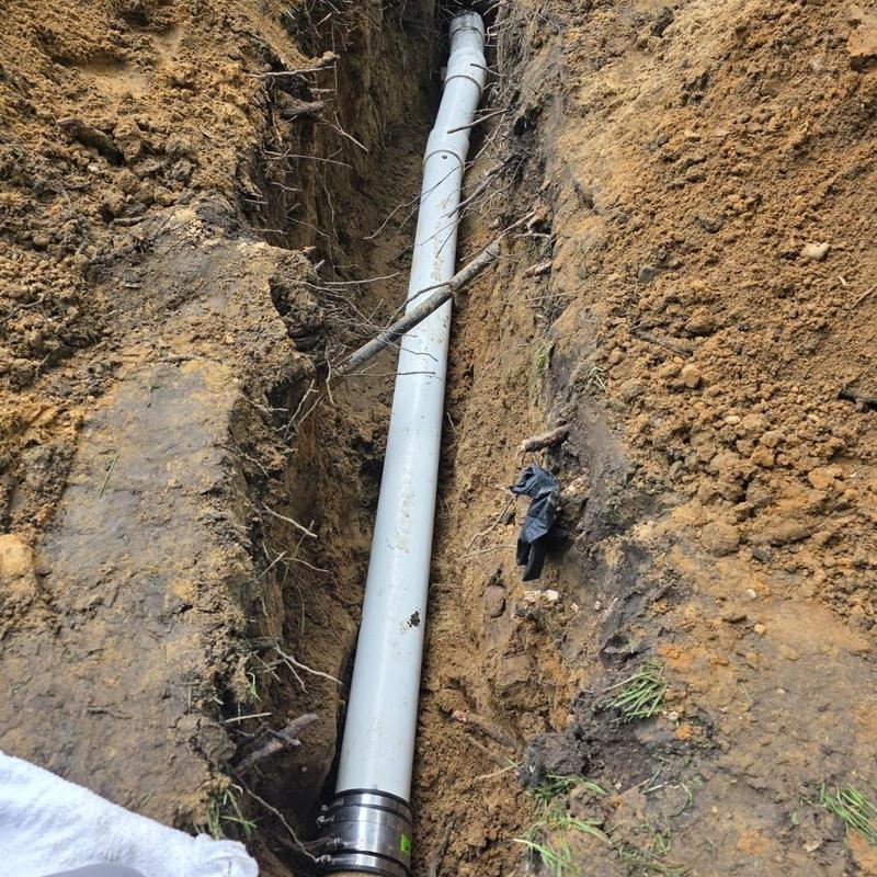 Septic field header pipe replaced in trench excavation Septic field header pipe replaced in trench excavation