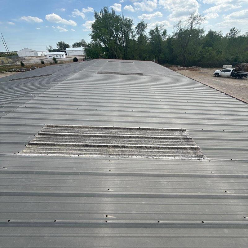 Metal roof panels showing hail damage spots