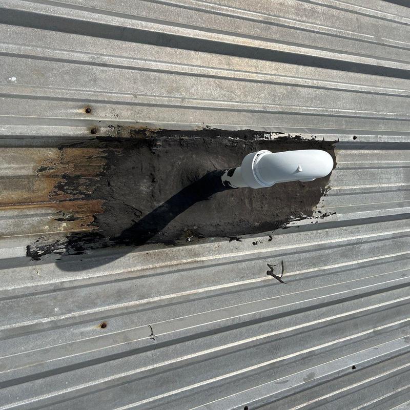 Metal roof pipe flashing with sealant repair