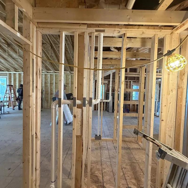 PVC plumbing pipes installation in home framing