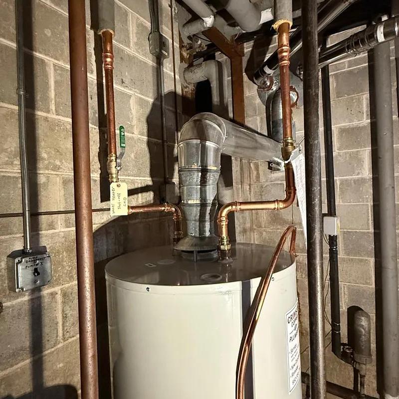 Water heater with copper piping in basement