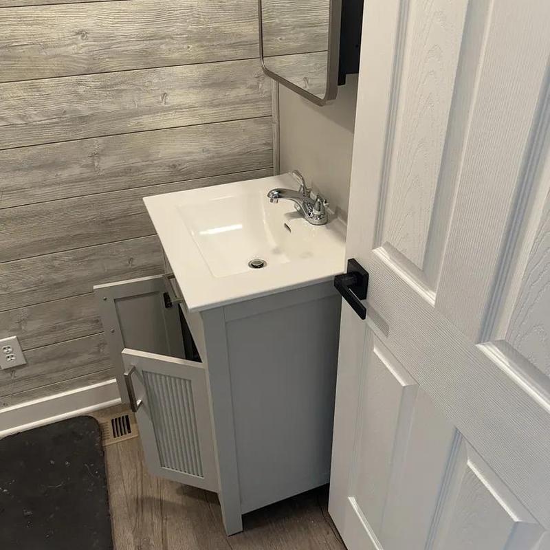 Bathroom sink and faucet installation in new bathroom