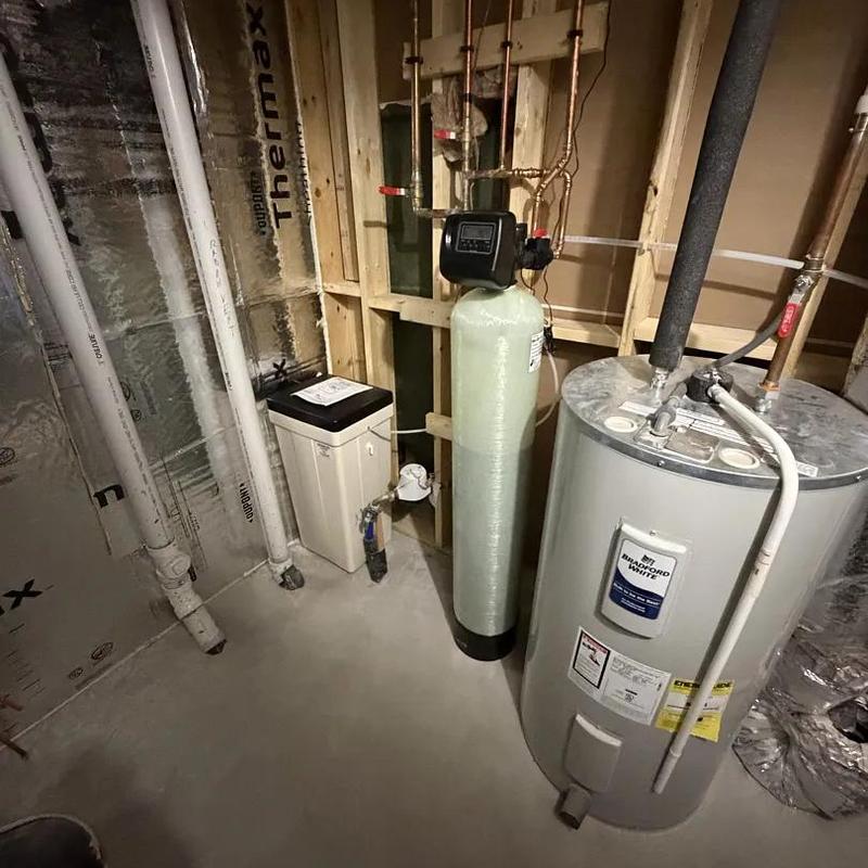 Water softener system and water heater installation in basement