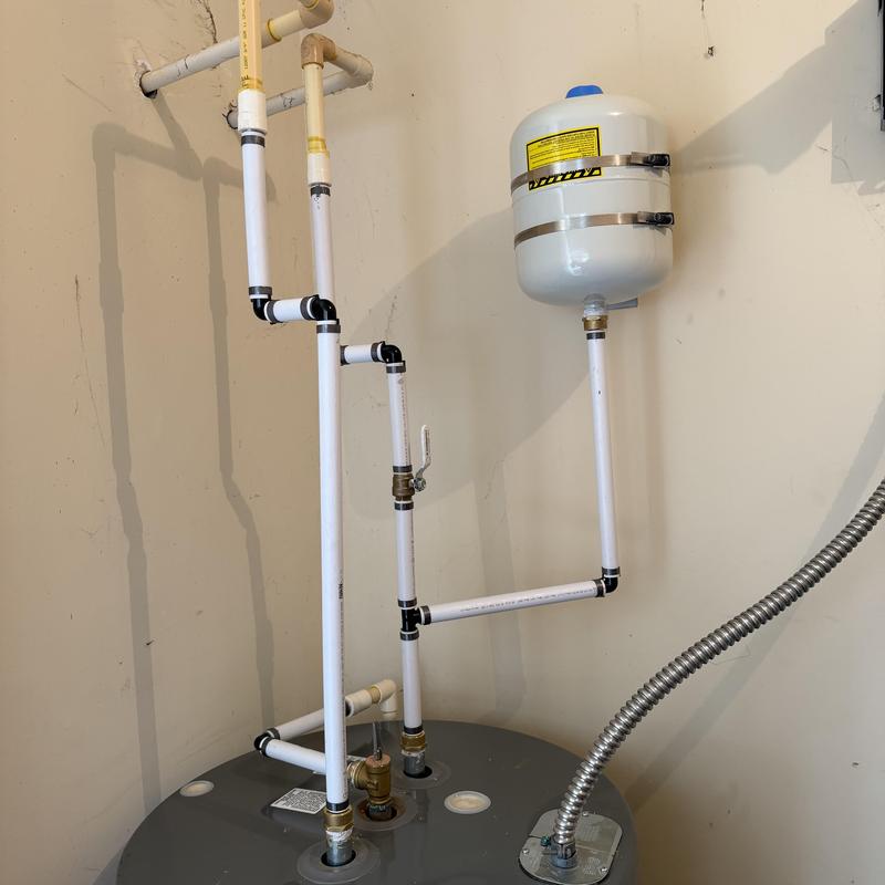 Water heater with new expansion tank and piping