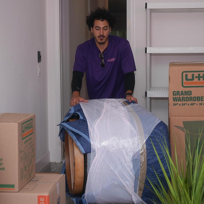 Wooden chair wrapped for local moving service