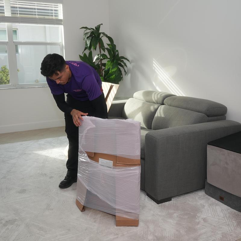 Furniture wrapped in plastic for local move
