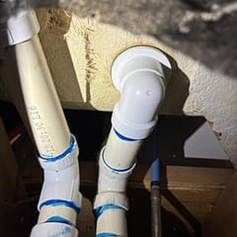 Lift and turn drain pipe with plumber's putty applied