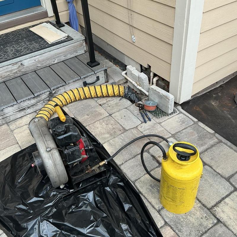 Plumbing smoke test equipment with hose and yellow tank Plumbing smoke test equipment with hose and yellow tank