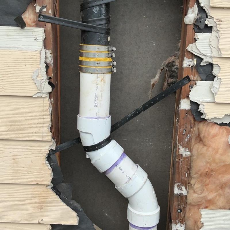 3-inch PVC drain pipe with cast iron transition clamps 3-inch PVC drain pipe with cast iron transition clamps