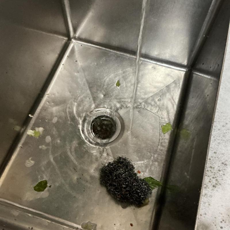 Commercial basket strainer in three-compartment sink drain Commercial basket strainer in three-compartment sink drain