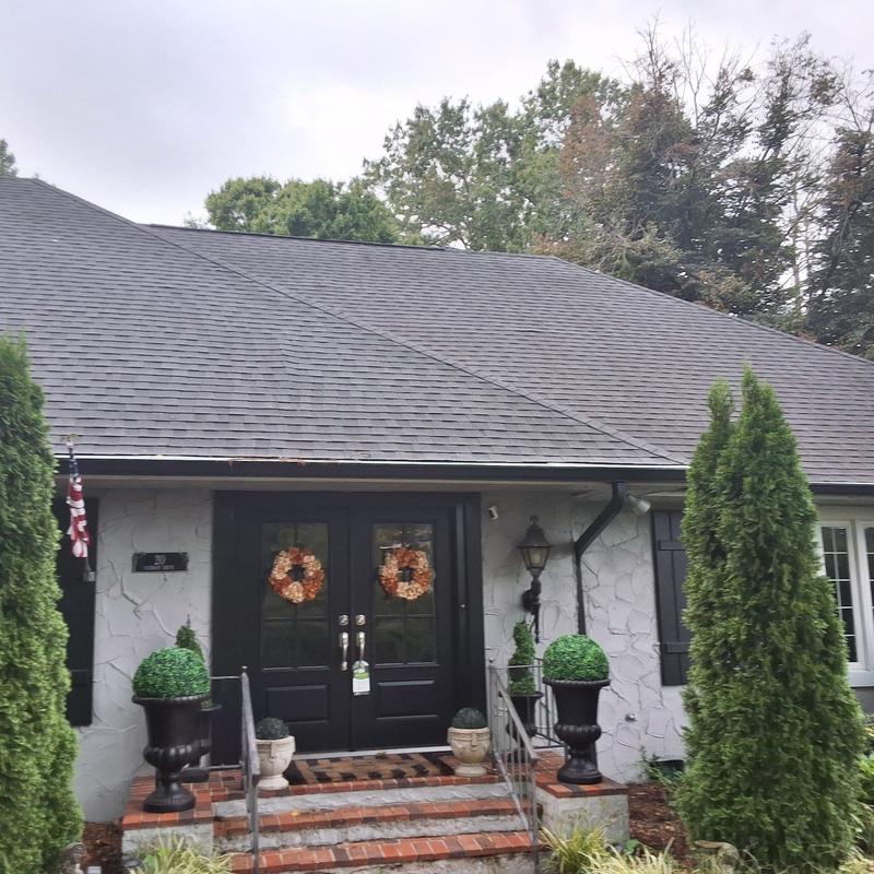 Asphalt shingle roof inspection on home exterior