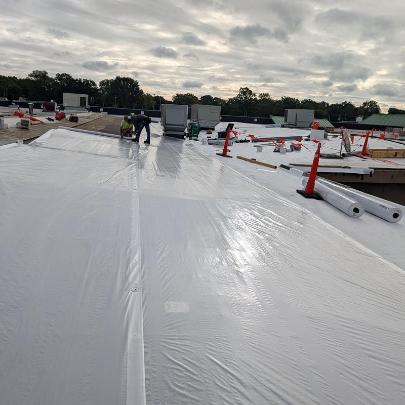 White TPO single ply roof restoration installation