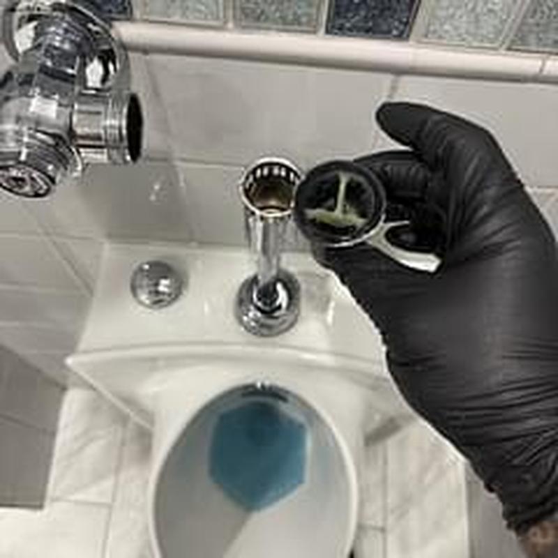 Flushometer valve removal from men's restroom urinal