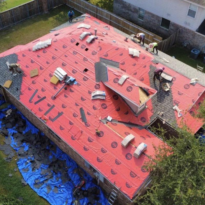 Roof underlayment installation on residential home Roof underlayment installation on residential home