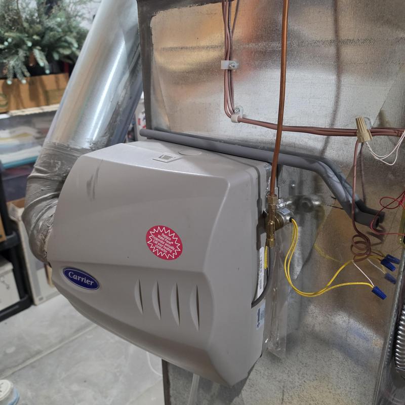 Carrier humidifier attached to furnace system Carrier humidifier attached to furnace system