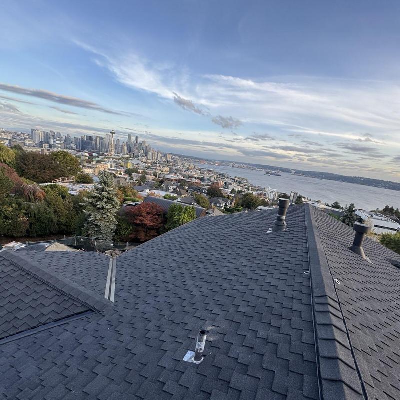 Asphalt shingle roof with Seattle cityscape view