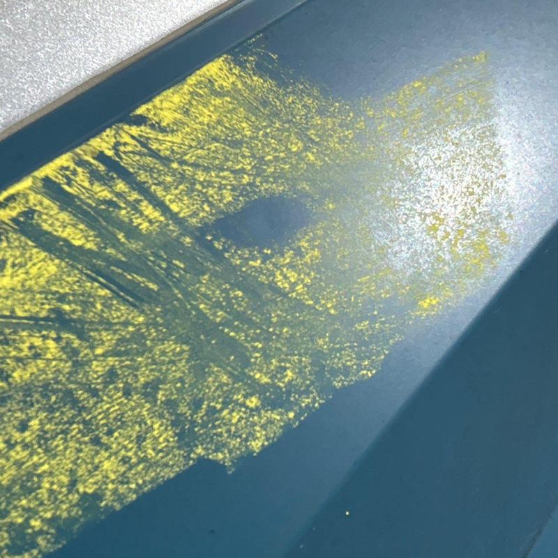 Metal roof panel with hail damage inspection markings